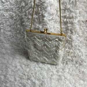 La Regale Handmade Beaded off white Handbag Clutch gold tone frame and strap.
